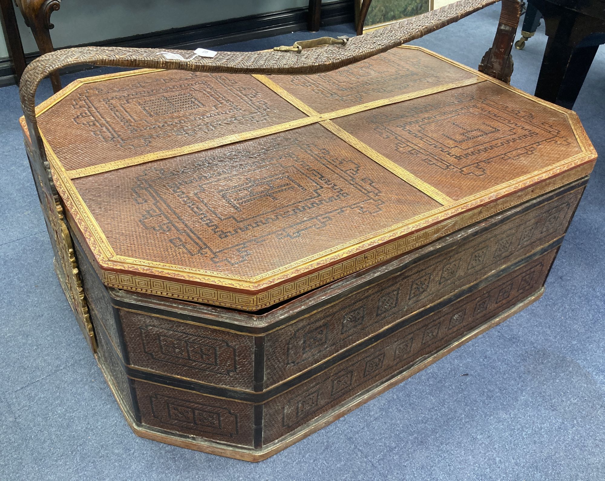 A large Chinese woven octagonal casket and cover, length 126cm, depth 92cm, height 64cm